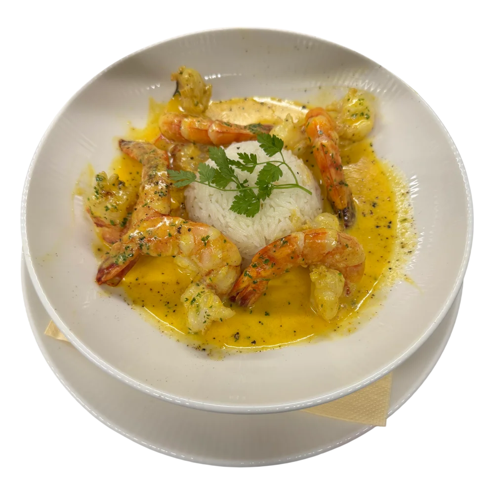 Scampis sauce crémeuse au curry et coco